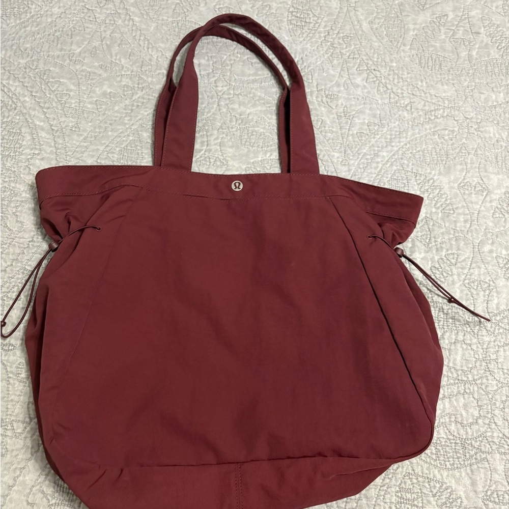 lululemon athletica Red Tote Bag with Side cinch and button close